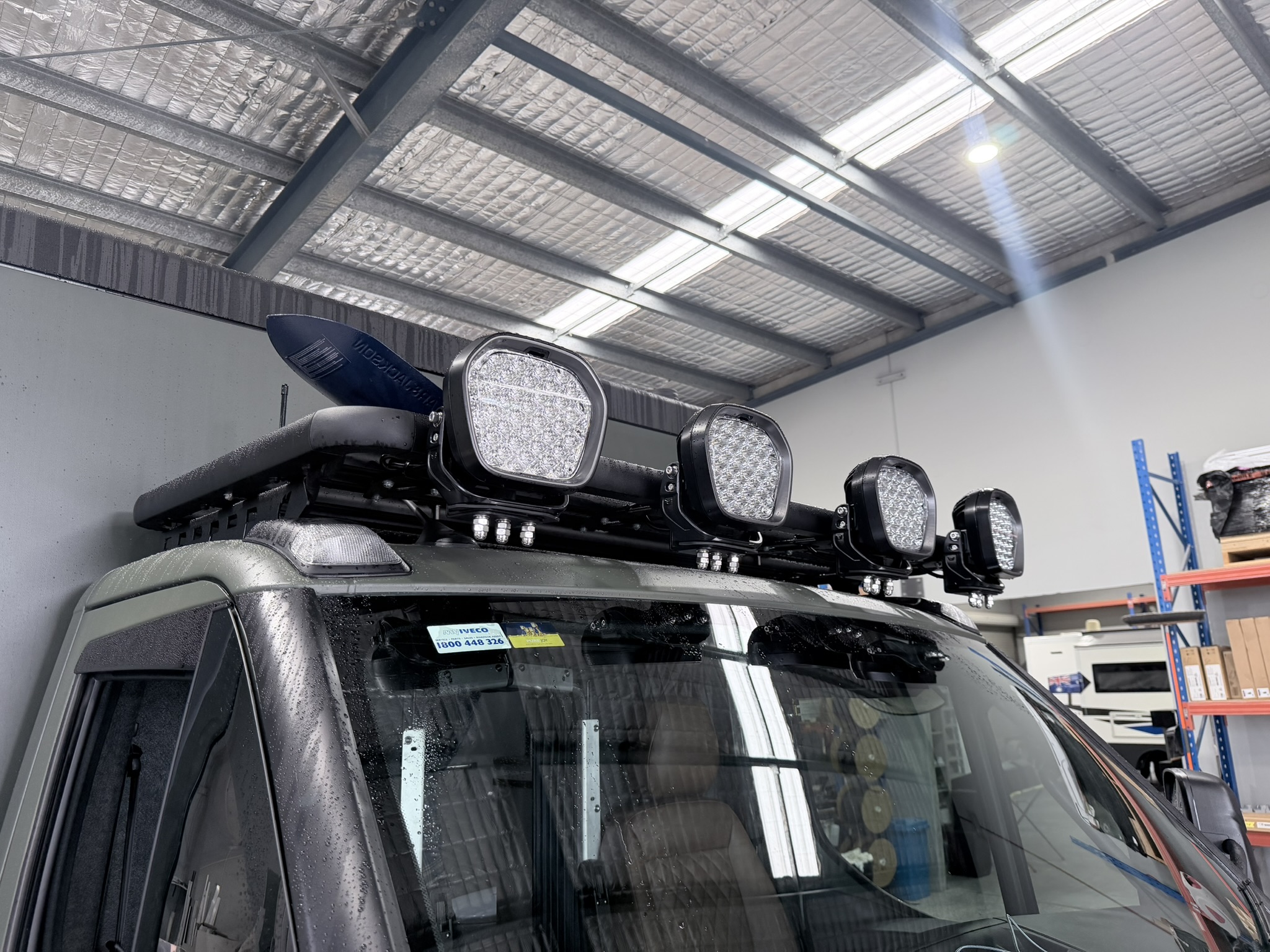 Wide shot of the four-light LED light bar mounted on the roof rack