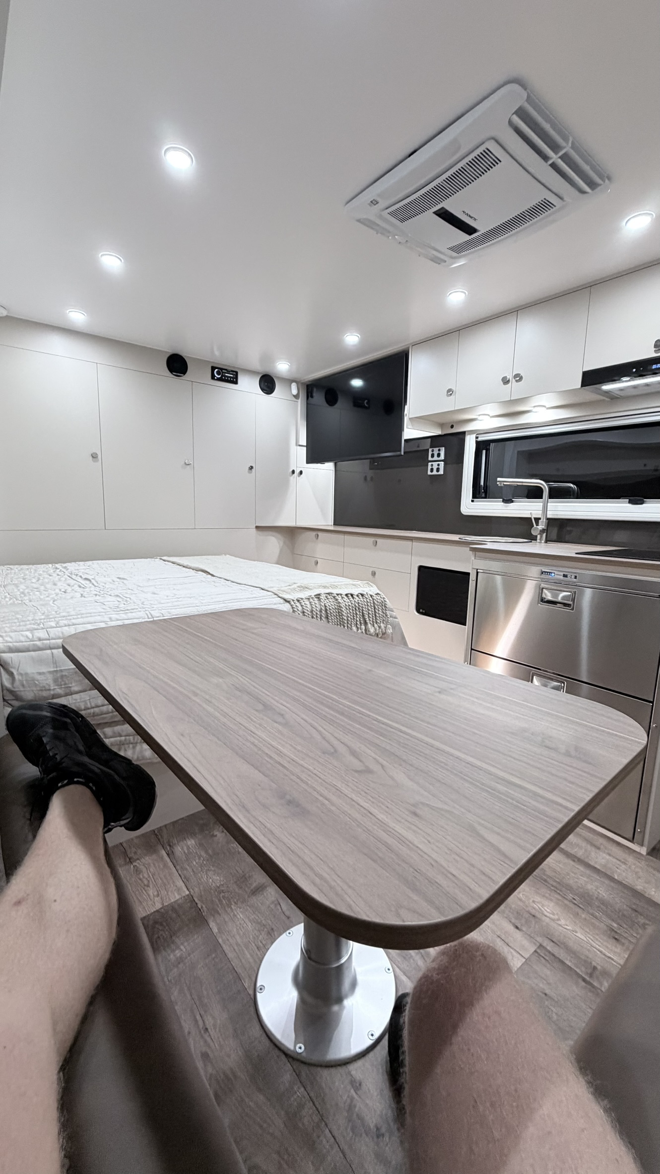 Wall-mounted smart TV above the kitchen