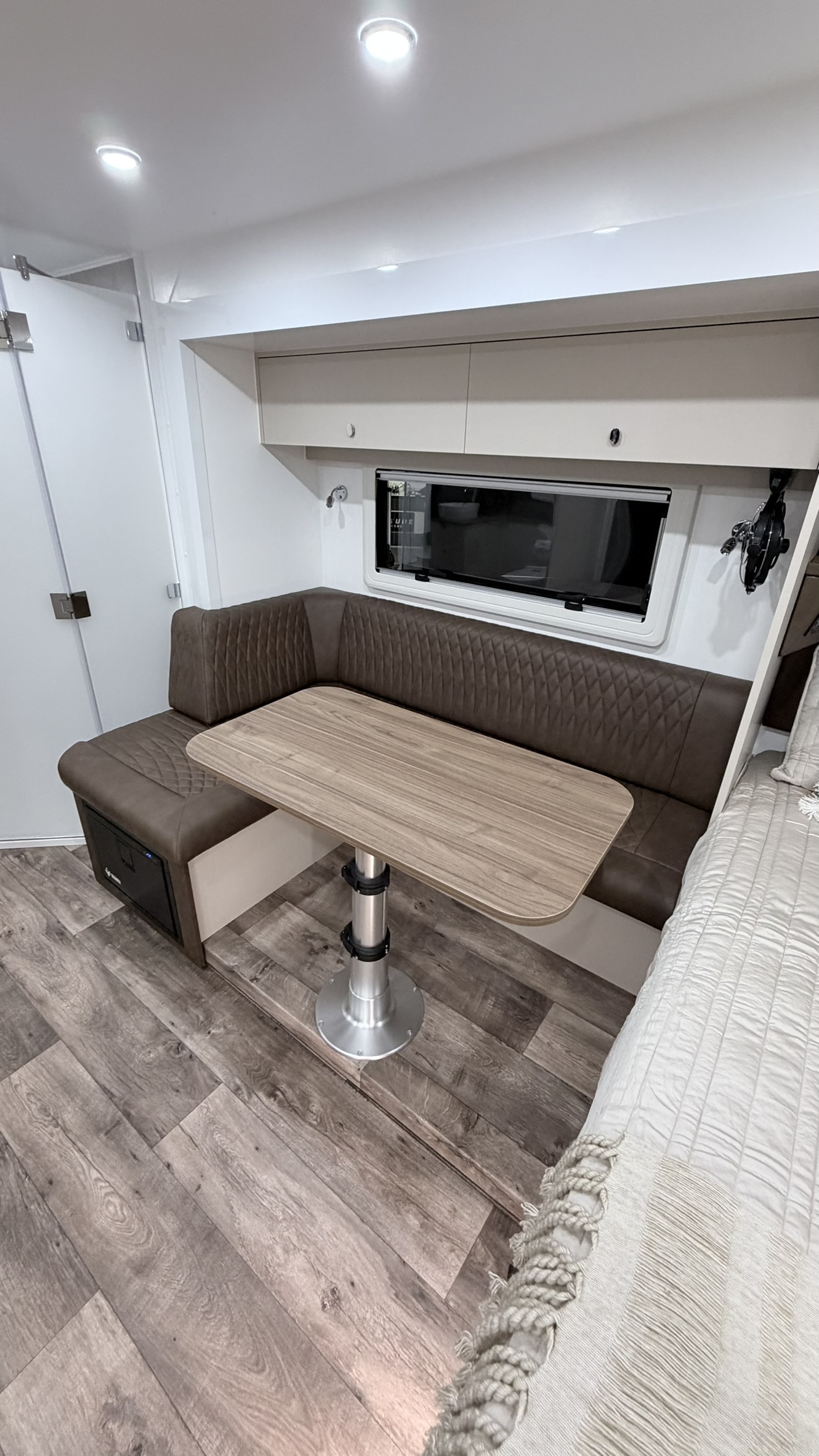 Leather quilted dinette seating with table