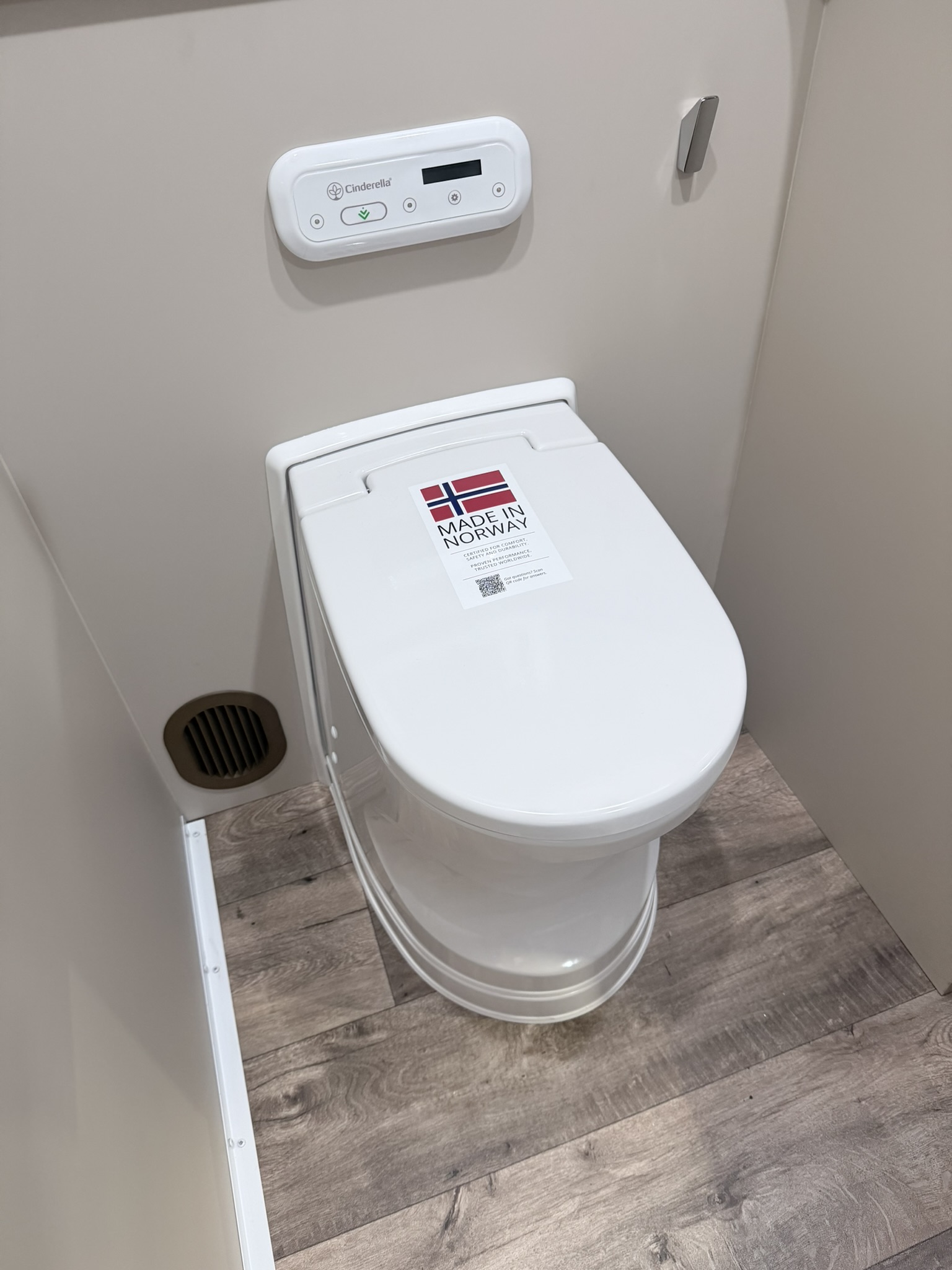 Cinderella incinerating toilet with control panel